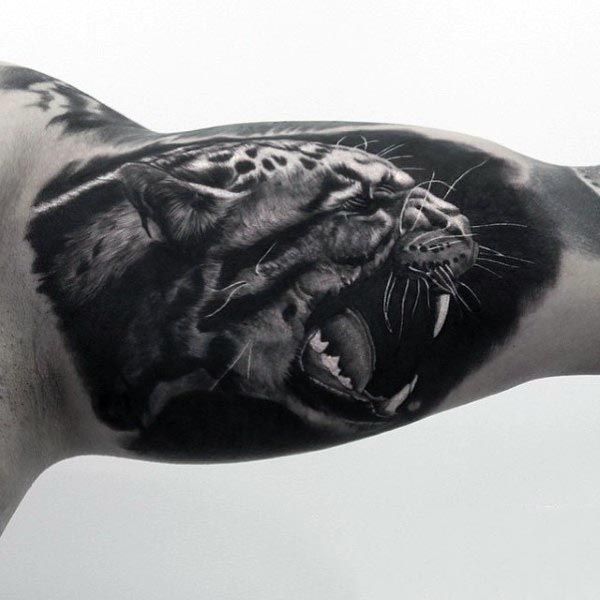 Black And Grey Jaguar Head Tattoo On Left Bicep