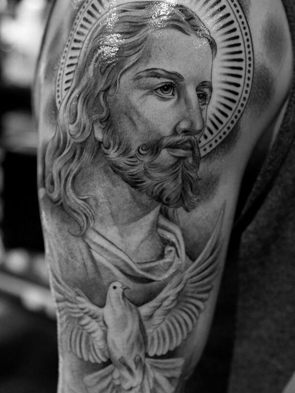 Black And Grey Jesus With Flying Bird Tattoo On Right Half Sleeve