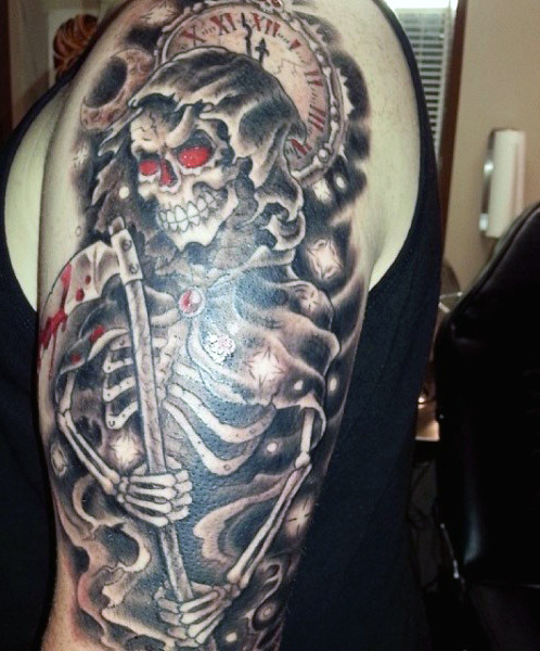 Black And Red Grim Reaper With Clock Tattoo On Man Left Half Sleeve