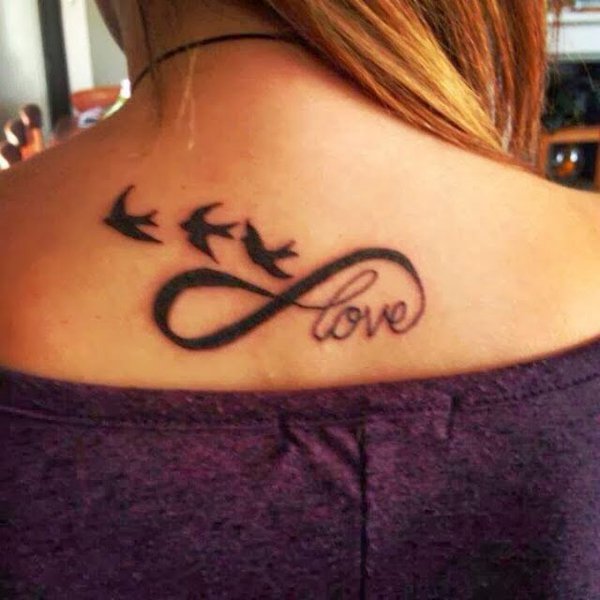Black Infinity With Love And Flying Birds Tattoo On Women Upper Back