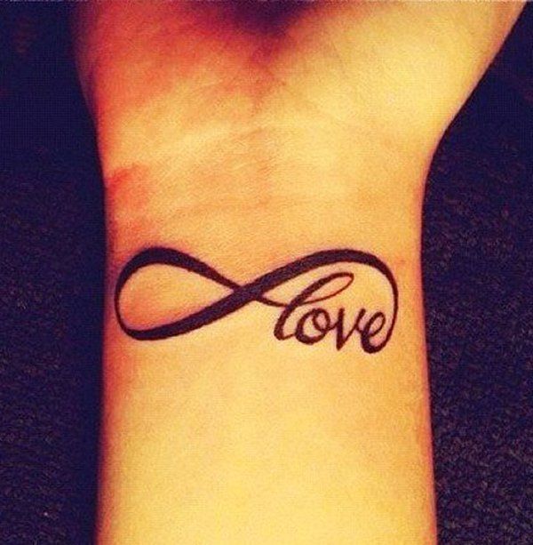Black Infinity With Love Tattoo On Right Wrist