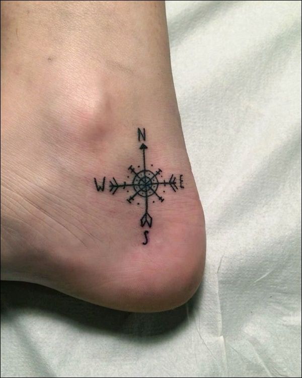 Black Ink Compass Tattoo On Girl Left Ankle