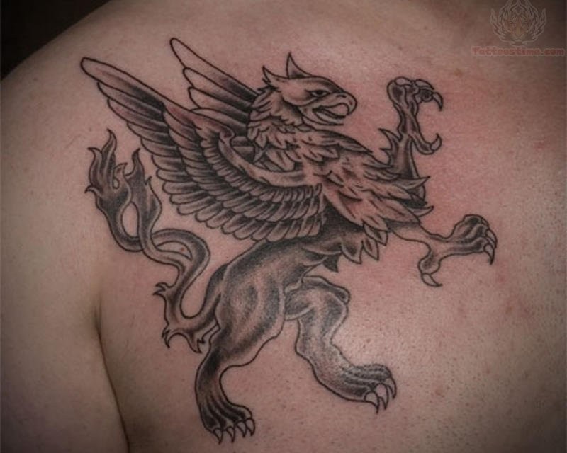 Black Ink Flying Griffin Tattoo On Man Right Front Shoulder