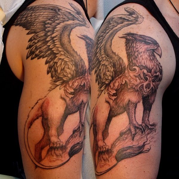 Black Ink Flying Griffin Tattoo On Man Right Half Sleeve