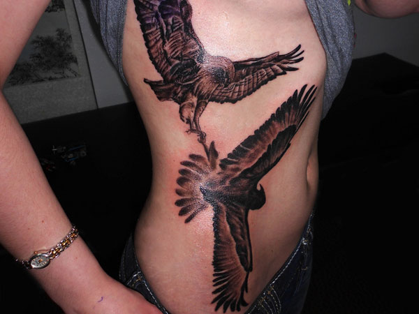 Black Ink Flying Two Hack Tattoo On Right Back Shoulder