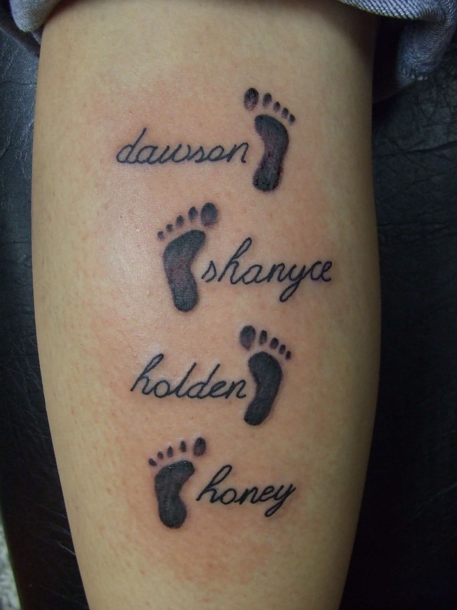 Black Ink Footprints Tattoo Design For Leg Calf