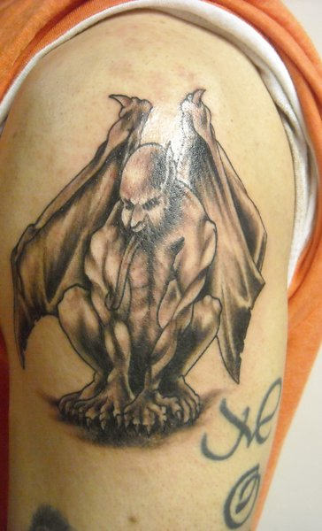 Black Ink Gargoyle Tattoo On Left Shoulder