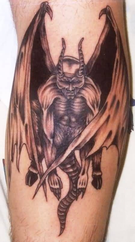 Black Ink Gargoyle Tattoo On Leg Calf