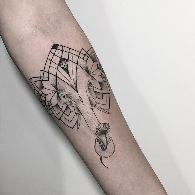 Black Ink Geometric Elephant Head Tattoo On Forearm
