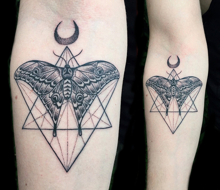 Black Ink Geometric Insect Tattoo On Forearm