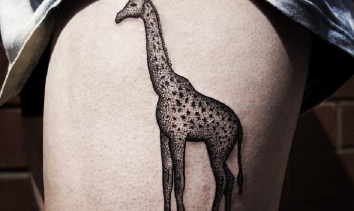 Black Ink Giraffe Tattoo On Shoulder