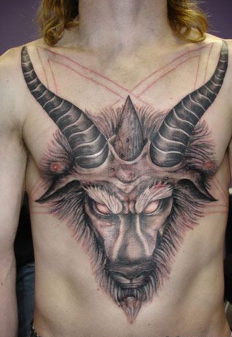 Black Ink Goat Head Tattoo On Man Chest