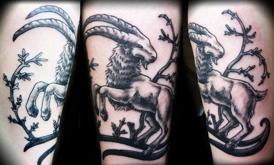 Black Ink Goat On Branch Tattoo On Forearm