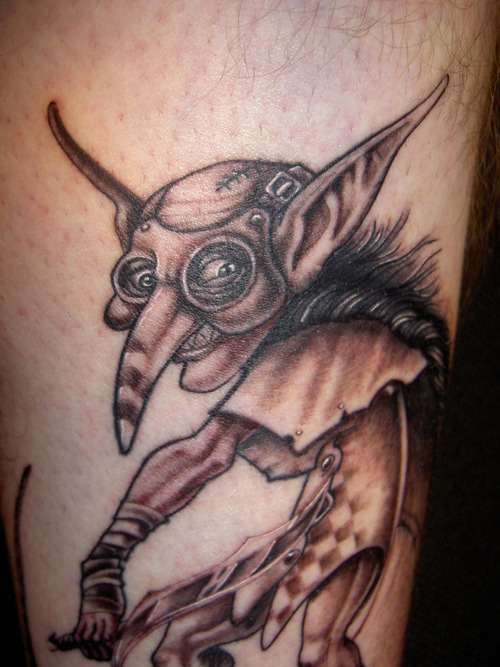 Black Ink Goblin Tattoo Design For Leg