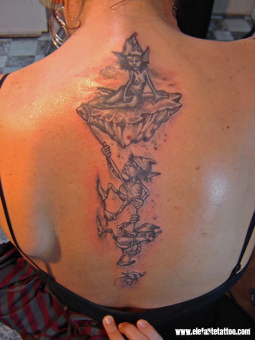 Black Ink Goblins Tattoo On Women Upper Back