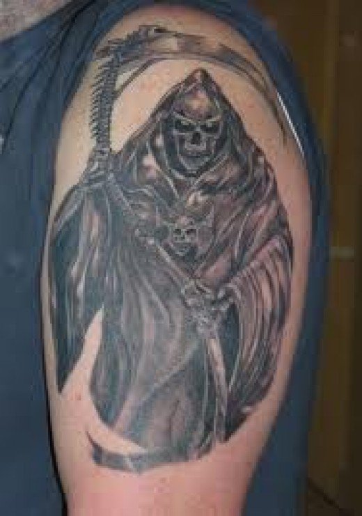 Black Ink Grim Reaper Tattoo On Man Left Shoulder