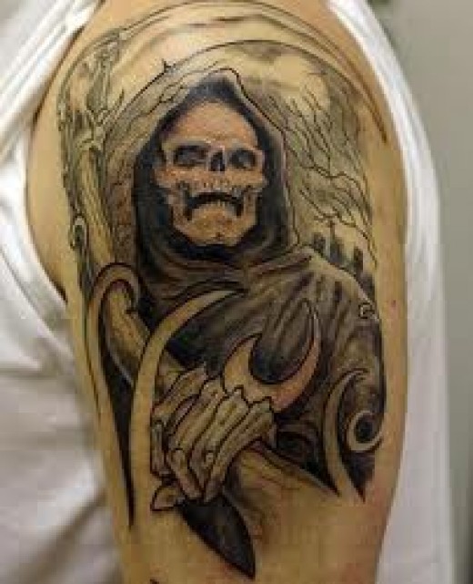 Black Ink Grim Reaper Tattoo On Shoulder