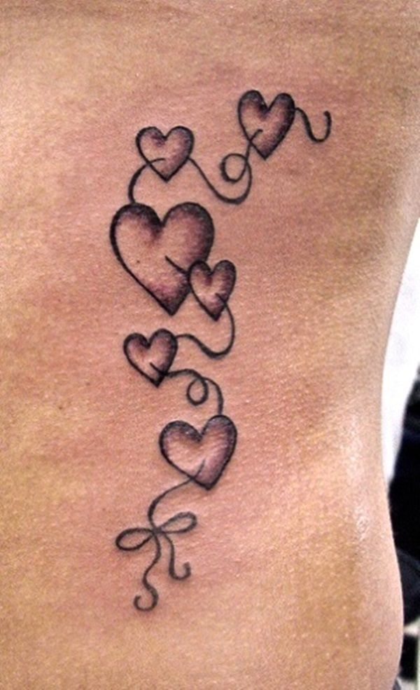 Black Ink Hearts Tattoo On Left Side Rib