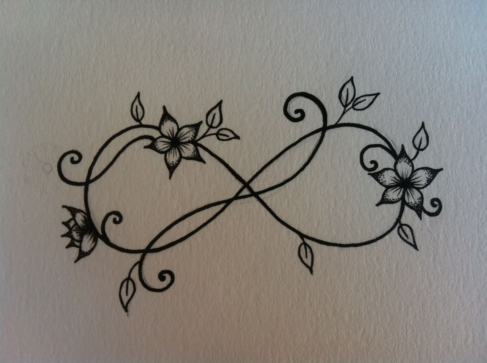 Black Ink Infinity With Flowers Tattoo Design