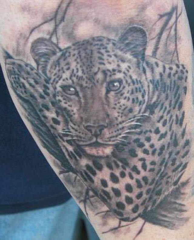 Black Ink Jaguar Head Tattoo Design For Sleeve