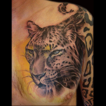 Black Ink Jaguar Head Tattoo On Man Left Chest