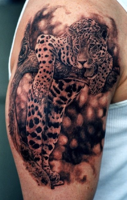 Black Ink Jaguar Head Tattoo On Man Right Half Sleeve