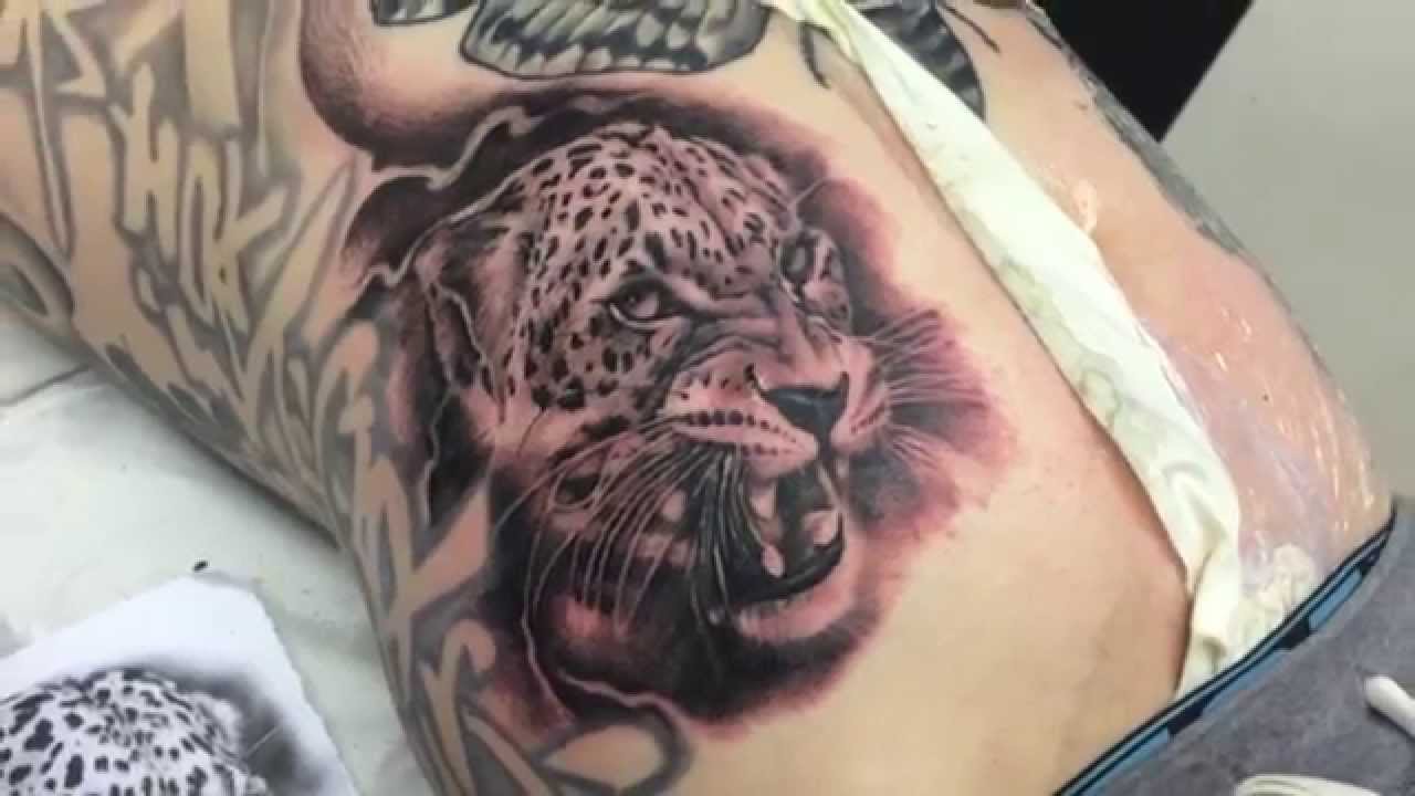 Black Ink Jaguar Head Tattoo On Right Side Rib