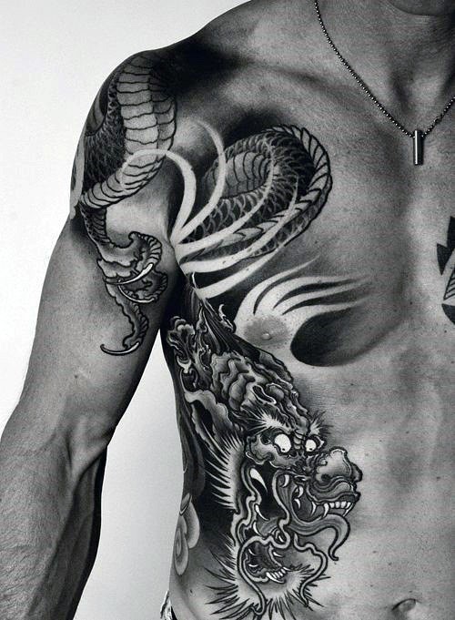 Black Ink Japanese Dragon Tattoo On Man Right Side Rib