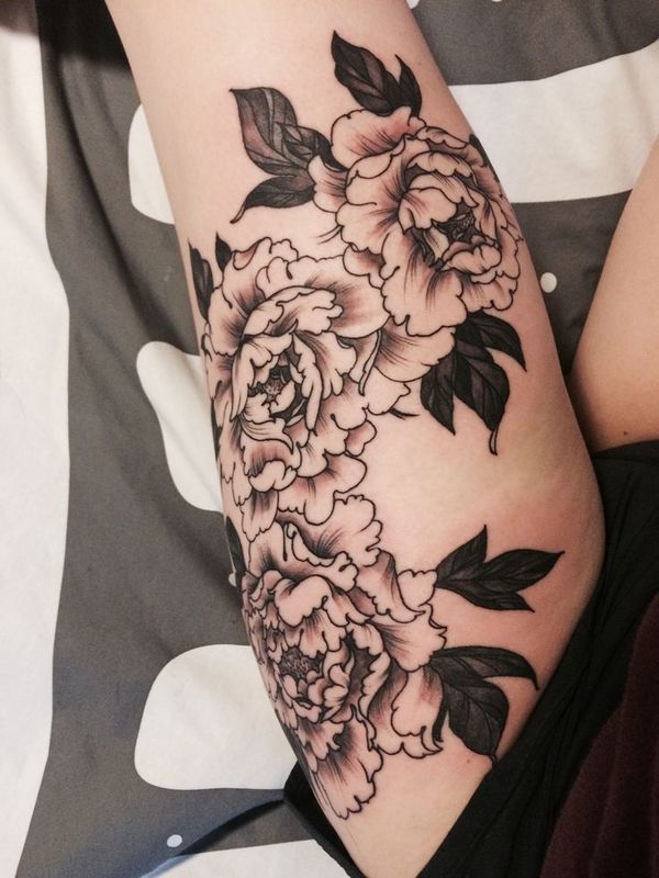 Black Ink Japanese Flowers Tattoo On Left Thigh