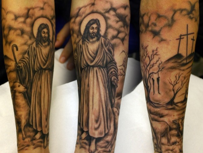 Black Ink Jesus Tattoo On Forearm