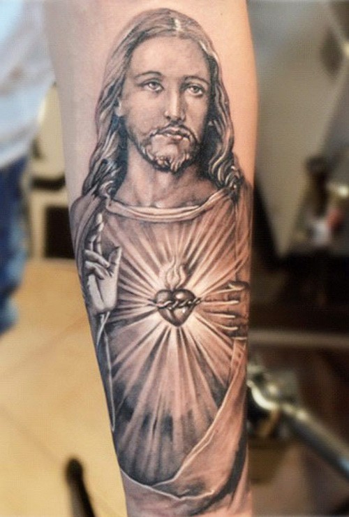 Black Ink Jesus Tattoo On Right Forearm