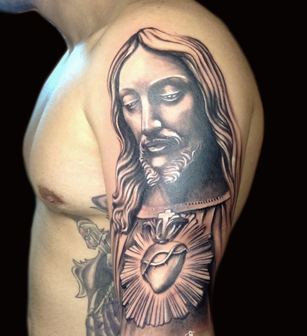 Black Ink Jesus With Cross Tattoo On Man Left Half Sleeve
