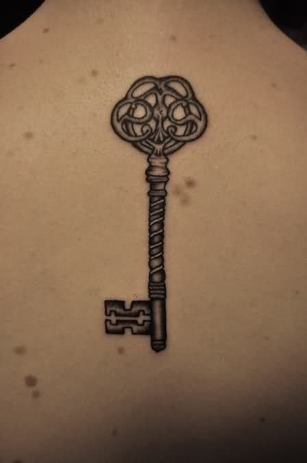 Black Ink Key Tattoo Design For Upper Back