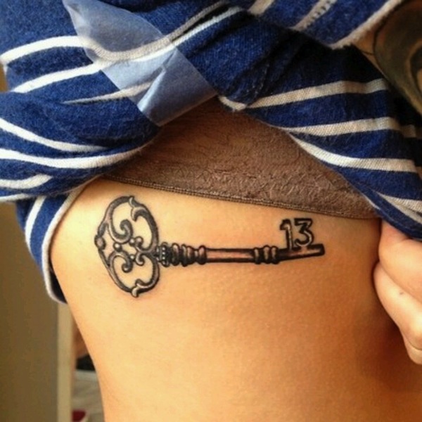 Black Ink Key Tattoo On Right Side Rib