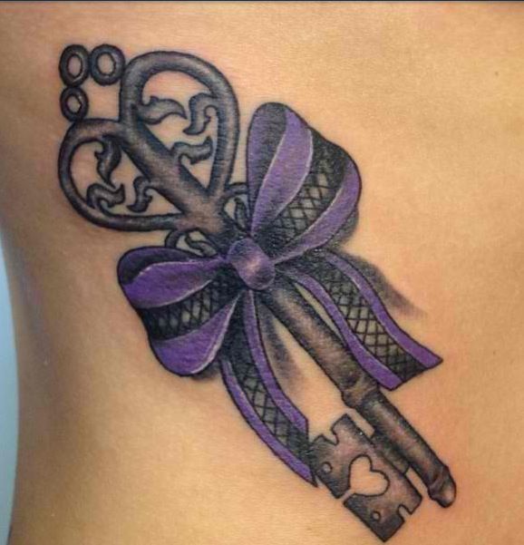 Black Ink Key With Bow Tattoo Design For Side Rib