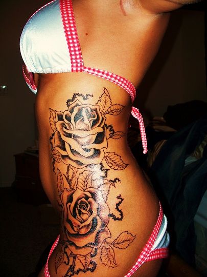 Black Ink Roses Tattoo On Girl Left Side Rib