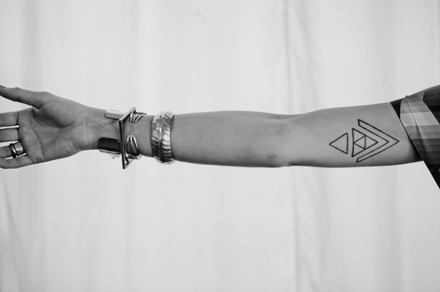Black Outline Geometric Triangle Tattoo On Right Bicep