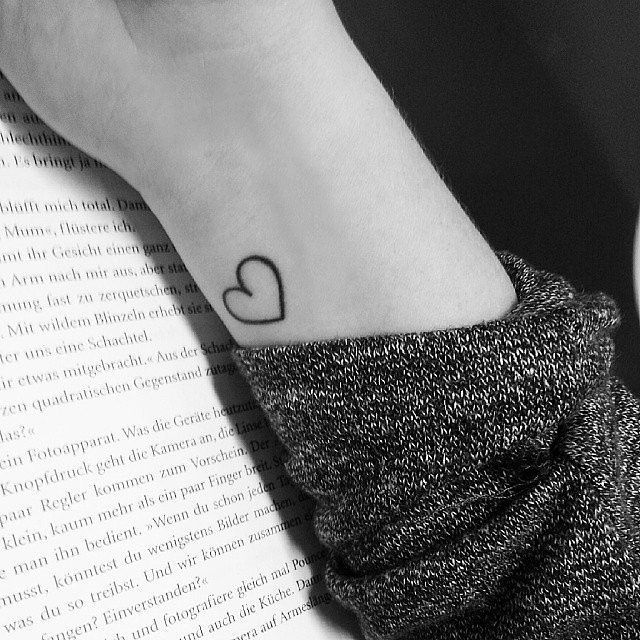 Black Outline Heart Tattoo On Wrist
