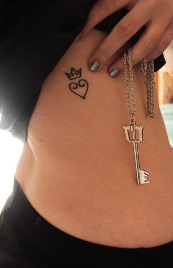 Black Outline Heart With Crown Tattoo On Right Side Rib
