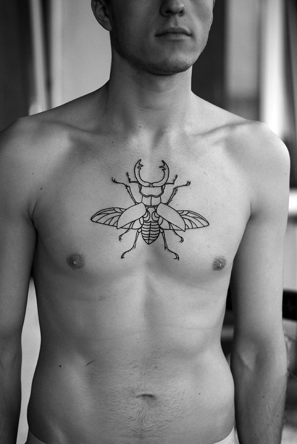 Black Outline Insect Tattoo On Man Chest