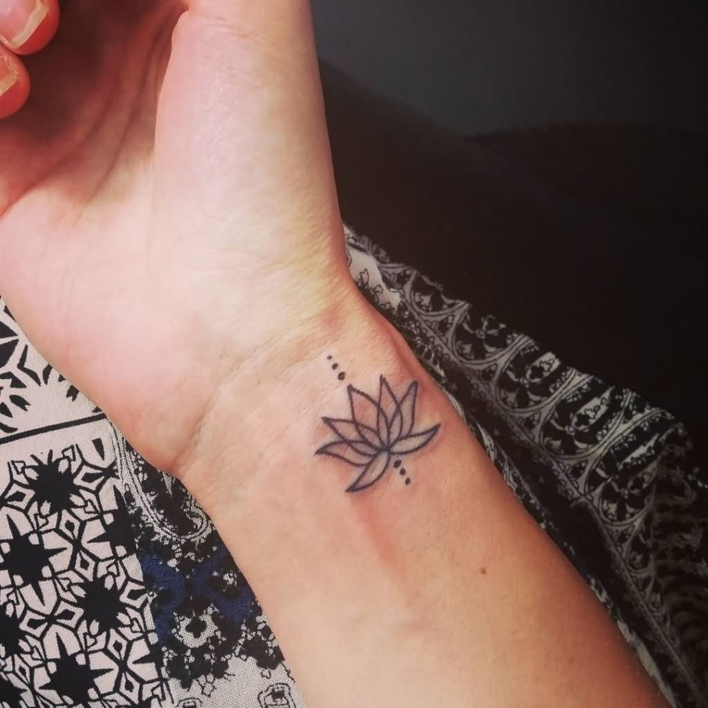 Black Outline Lotus Flower Tattoo On Girl Right Wrist