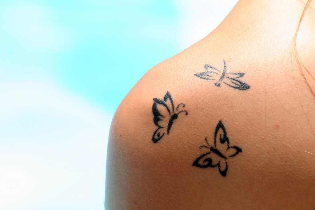 Black Tribal Flying Butterflies Tattoo On Right Shoulder