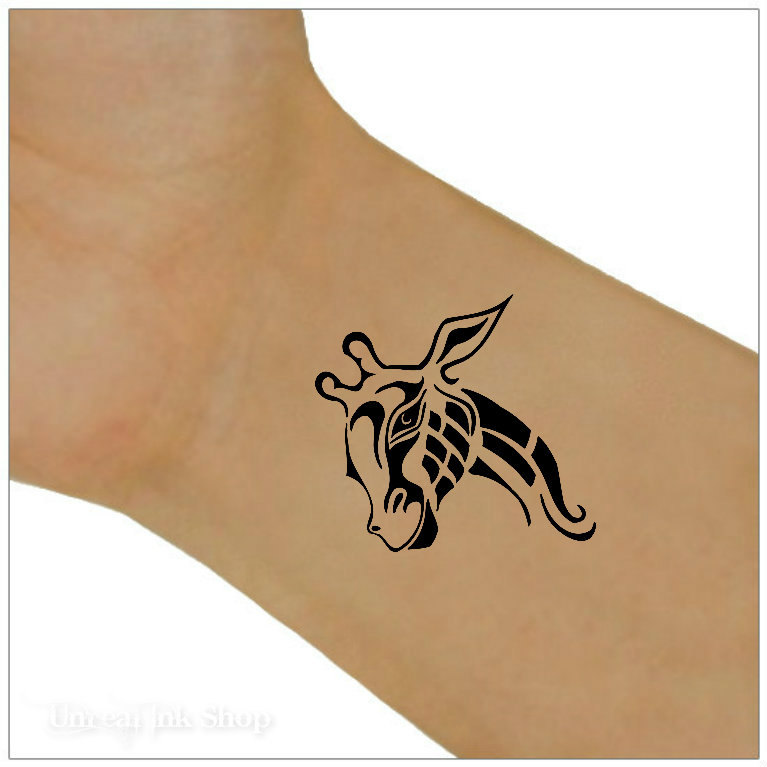 Black Tribal Giraffe Head Tattoo On Wrist