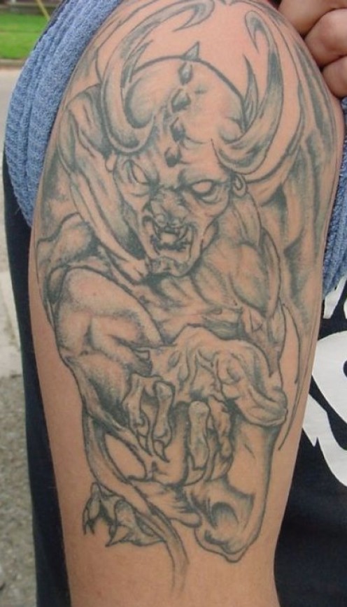 Classic Black And Grey Gargoyle Tattoo On Man Right Half Sleeve