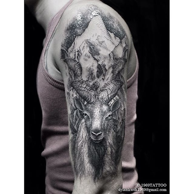 Classic Black And Grey Goat Tattoo On Man Left Half Sleeve