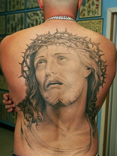 Classic Black And Grey Jesus Head Tattoo On Man Full Back