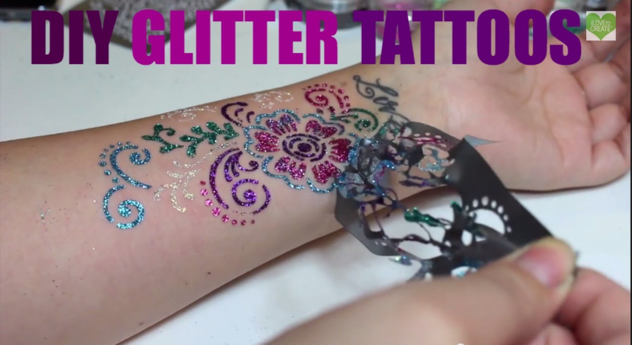 Colorful Glitter Flowers Tattoo On Left Wrist