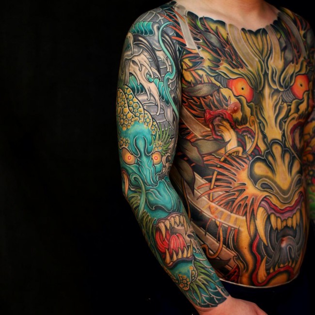 Colorful Japanese Dragon Tattoo On Man Stomach