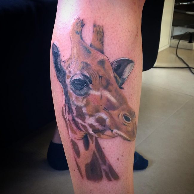 Cool 3D Giraffe Head Tattoo On Right Leg Calf