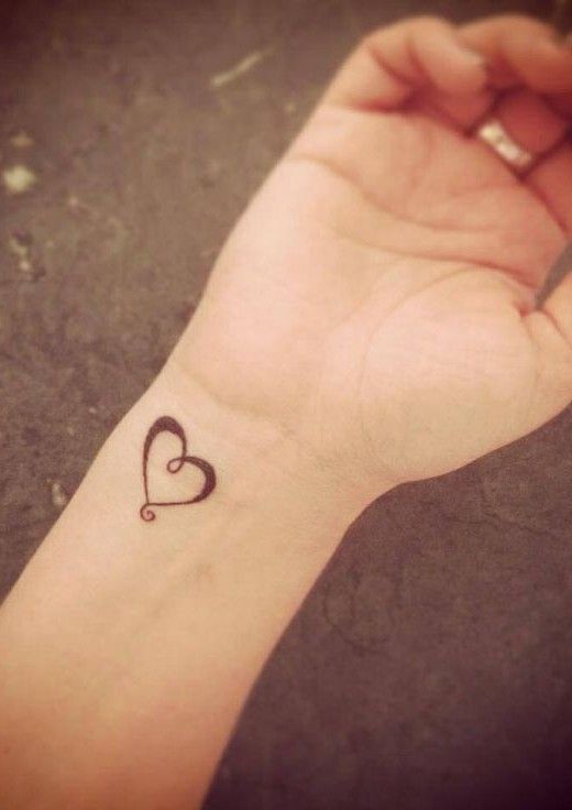 Cool Black Heart Tattoo On Right Wrist